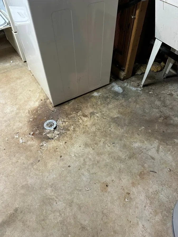 An appliance pulled out to dry a supply-line leak in a Kannapolis, NC home