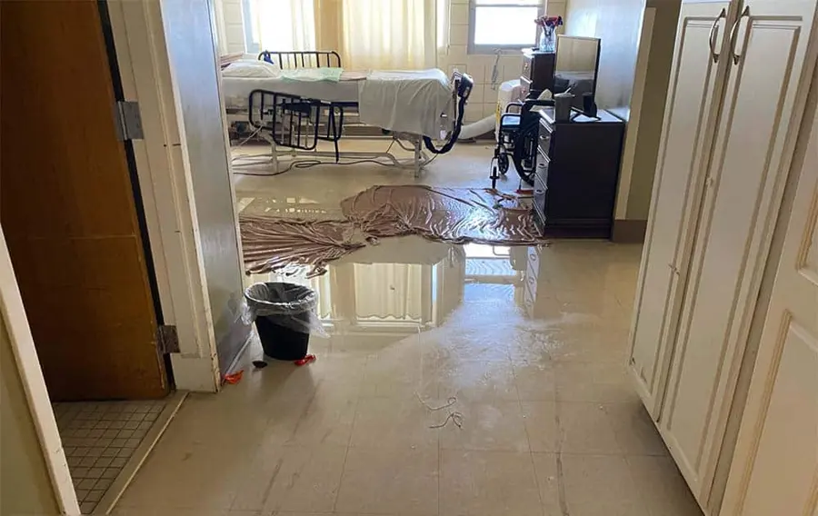 Storm flood water damage across the floor of a Kannapolis, NC home